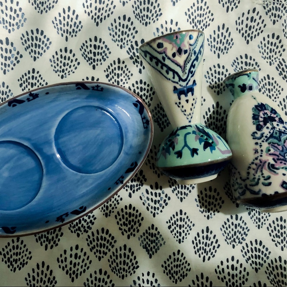 Anthropologie salt and pepper shakers with tray.